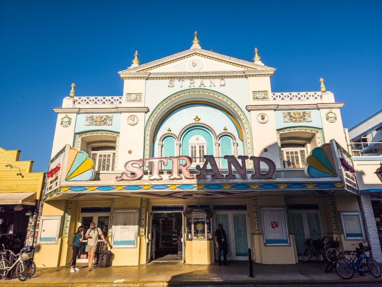 KEY WEST, FLORIDA - FEBRUARY 21, 2023: View of Strand Theater on Duval Street. Strand Theater was sold to Walgreens in December of 2001 and closed in April of 2002 when it became a Walgreens store.